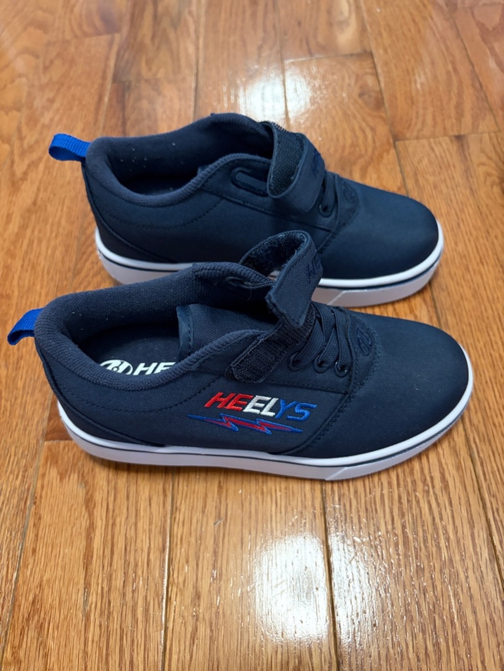Heelys Kids Navy Blue and White Rolling Sneakers with Red & Blue Logo